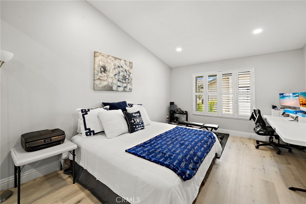 18134 Rustic Court Fountain Valley, CA 92708 - Photo 22 of 40 Primary suite with high ceilings and recessed lighting