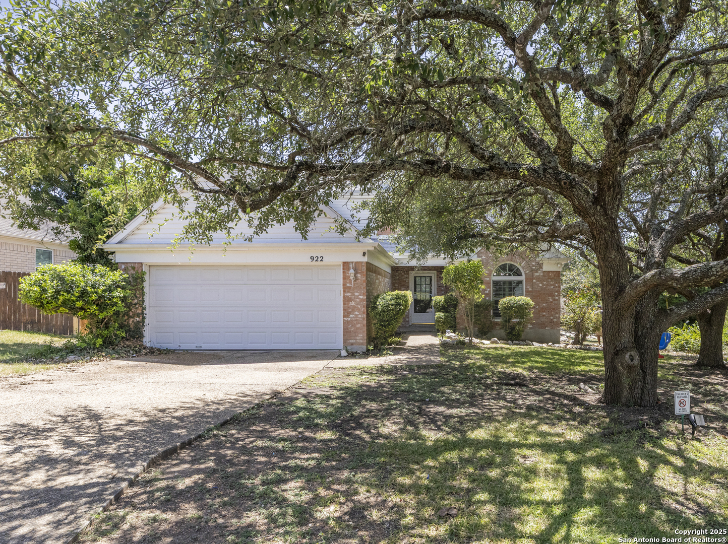 922 Hedgestone Drive San Antonio, TX 78258 - Photo 1 of 40 a view of a yard with large tree