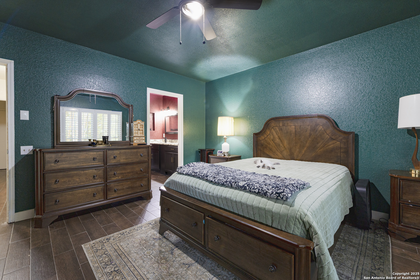 922 Hedgestone Drive San Antonio, TX 78258 - Photo 13 of 40 a bedroom with a bed and a dresser