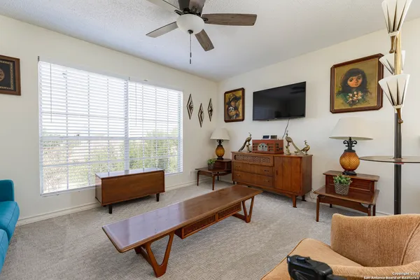 a view of storage and utility room with washer and dryer
