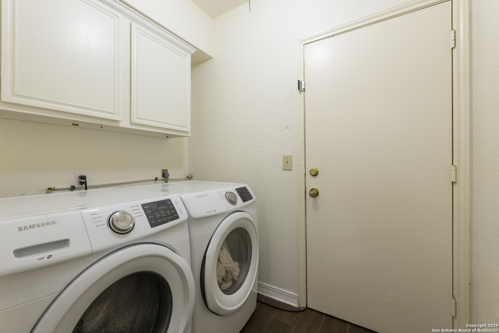 922 Hedgestone Drive San Antonio, TX 78258 - Photo 24 of 40 a view of storage and utility room with washer and dryer
