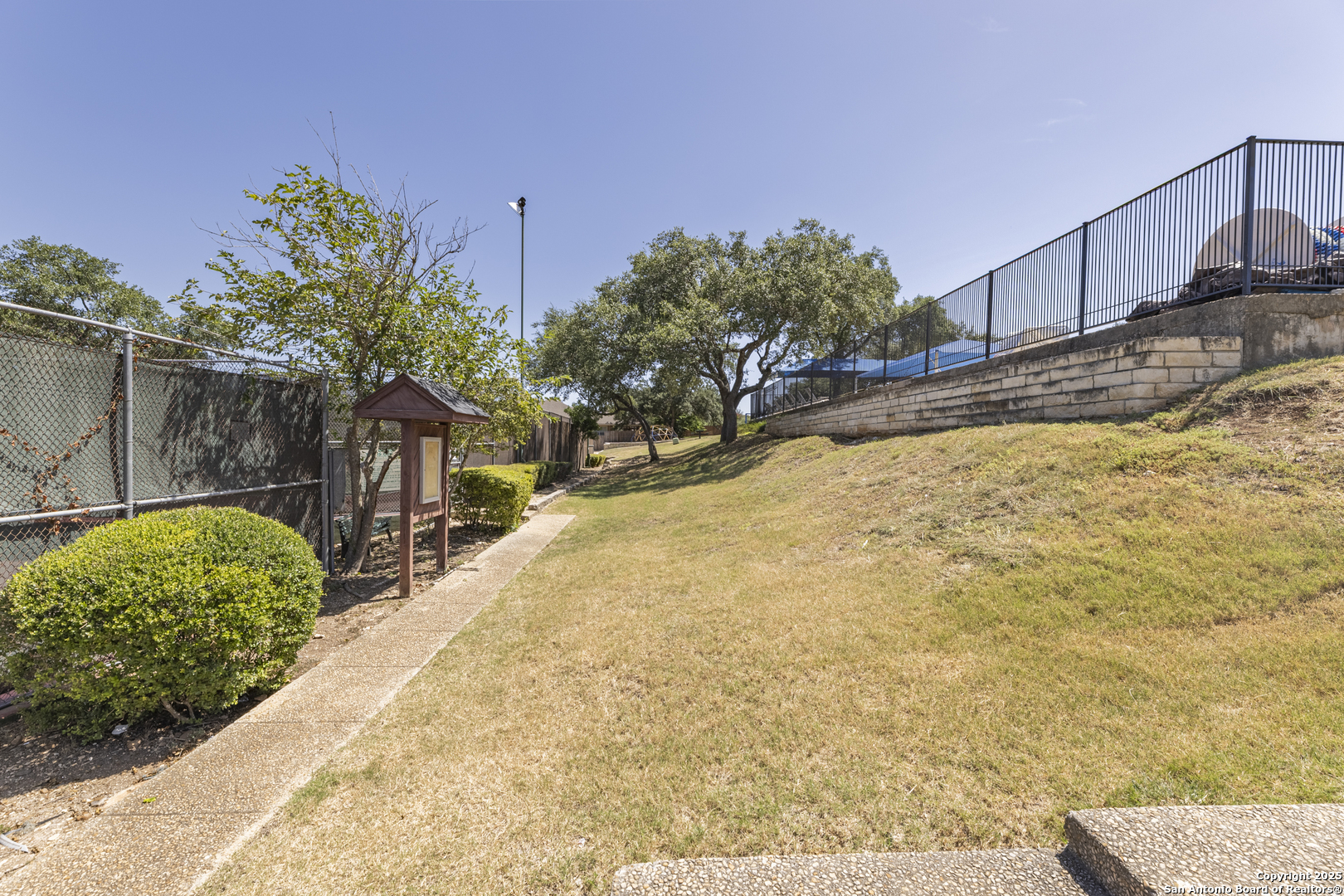 922 Hedgestone Drive San Antonio, TX 78258 - Photo 36 of 40 a view of a backyard of the house