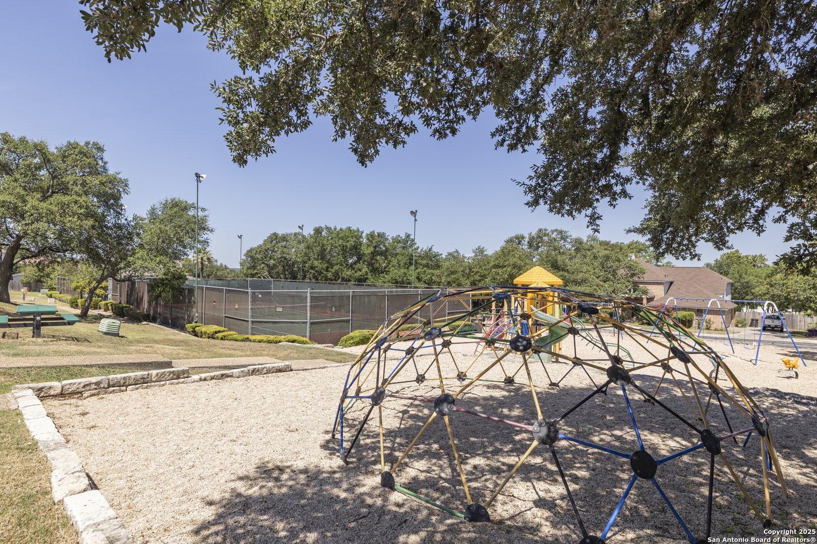 922 Hedgestone Drive San Antonio, TX 78258 - Photo 37 of 40 a view of a swimming pool with a yard