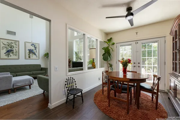 a view of a dining room with furniture window and outside view