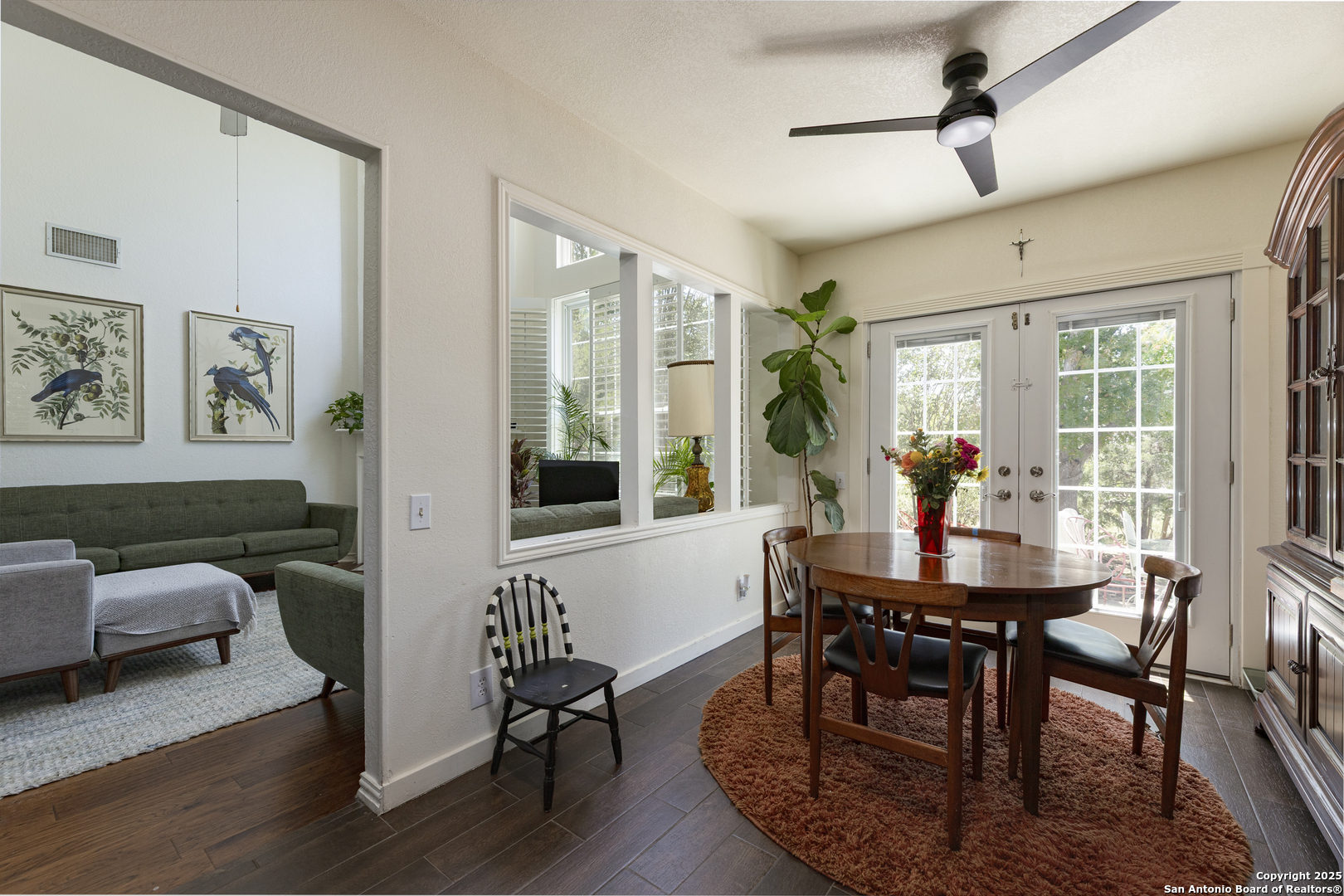 922 Hedgestone Drive San Antonio, TX 78258 - Photo 9 of 40 a view of a dining room with furniture window and wooden floor
