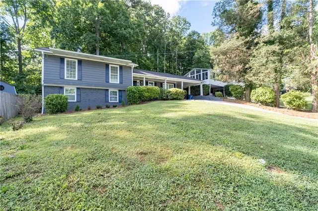 front view of a house with a yard