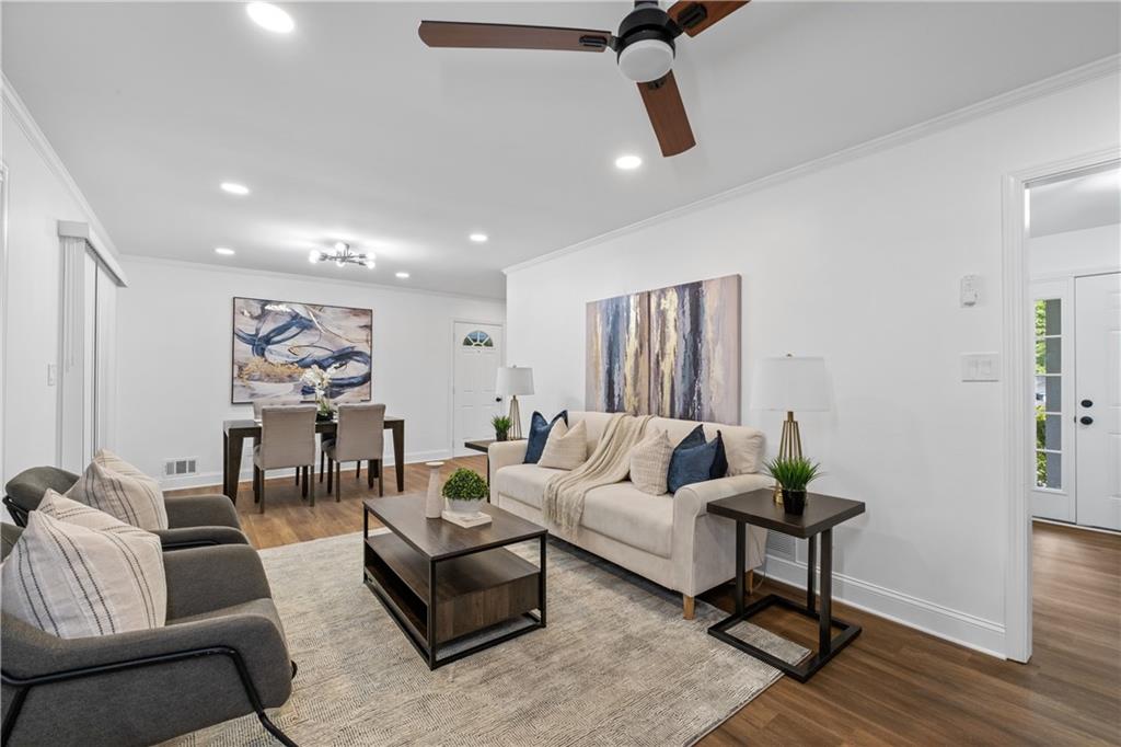 3144 Flamingo Drive East Point, GA 30344 - Photo 19 of 47 a living room with furniture and wooden floor