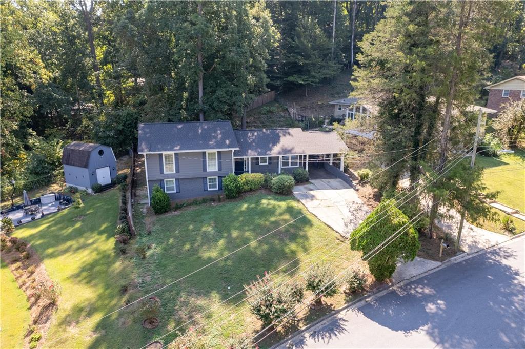 3144 Flamingo Drive East Point, GA 30344 - Photo 2 of 47 a aerial view of a house with a yard table and chairs