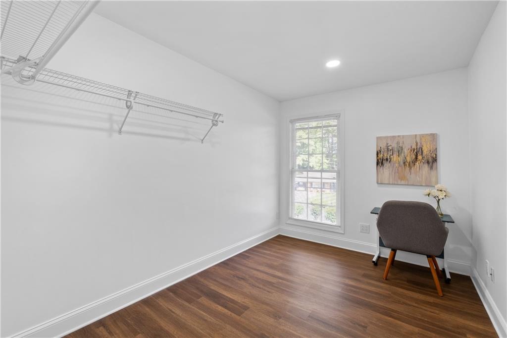 3144 Flamingo Drive East Point, GA 30344 - Photo 32 of 47 a view of a workspace with wooden floor and a window