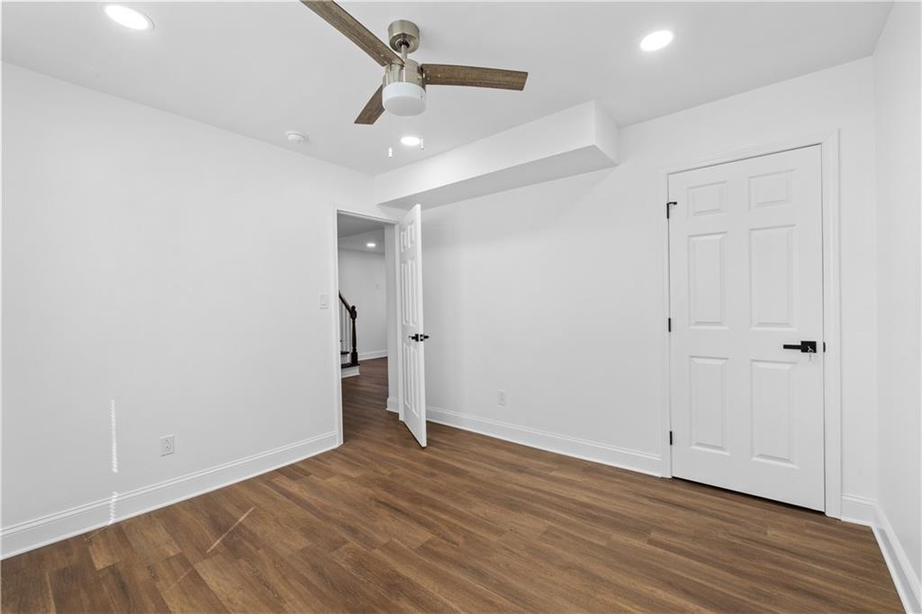 3144 Flamingo Drive East Point, GA 30344 - Photo 40 of 47 a view of empty room with wooden floor
