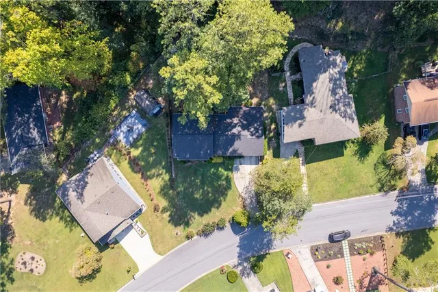 an aerial view of a house with a garden
