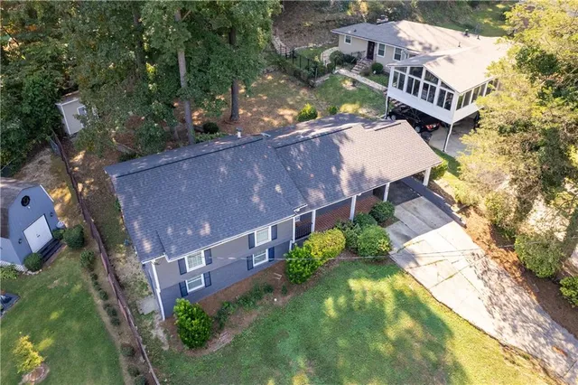an aerial view of houses and roads