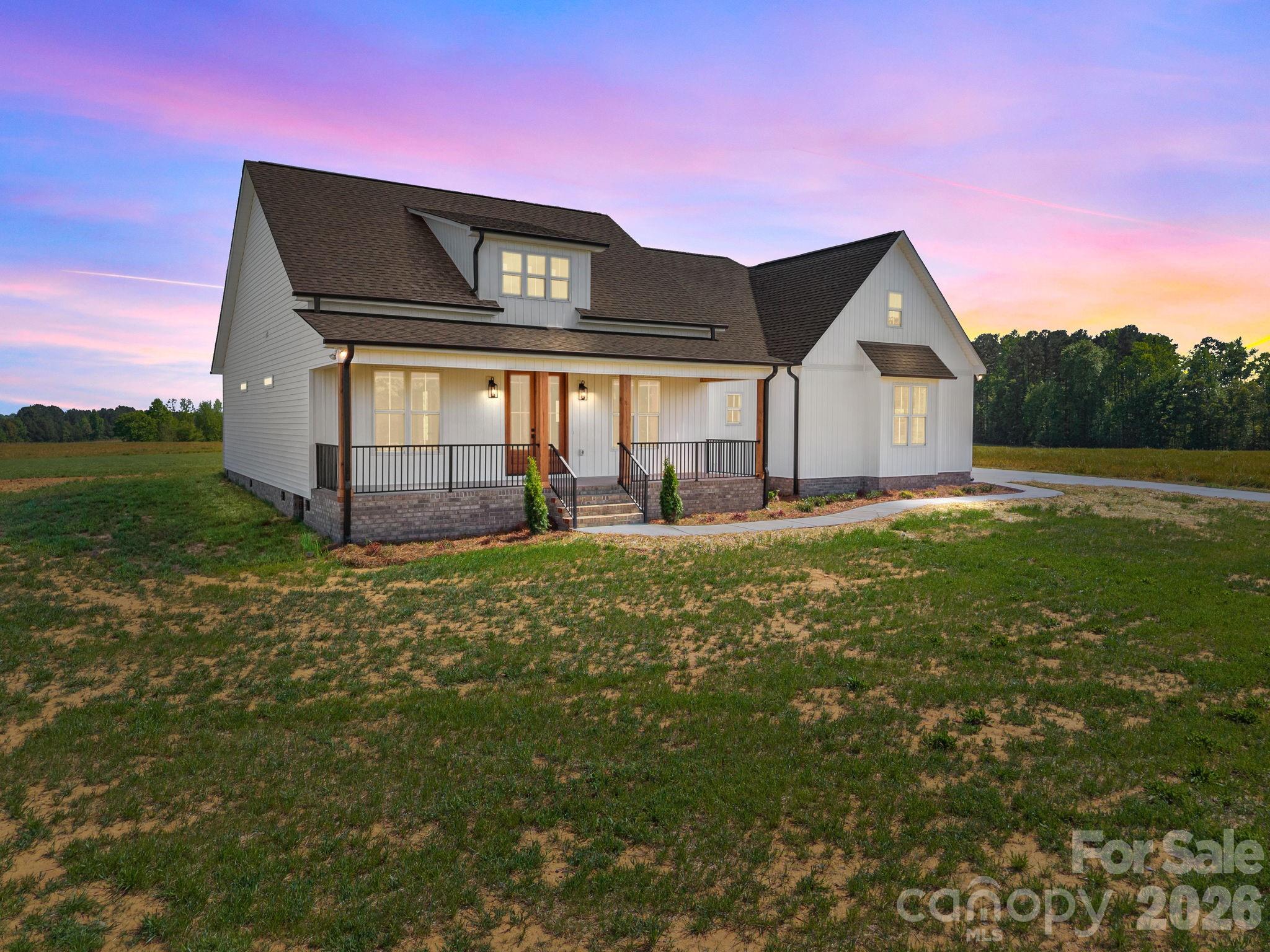 4805 Patterson Road China Grove, NC 28023 - Photo 1 of 42 a front view of a house with a yard