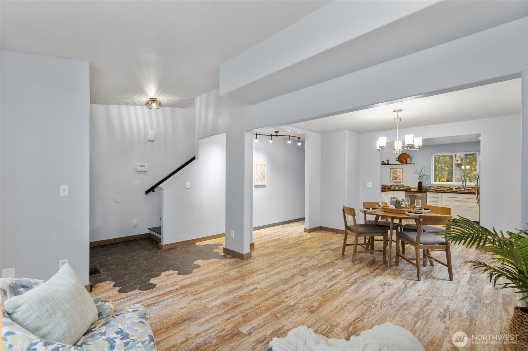 7506 353rd Street South Roy, WA 98580 - Photo 11 of 38 a view of a dining room with furniture and wooden floor