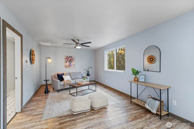a living room with furniture and window