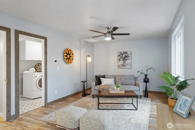 a living room with furniture and decor