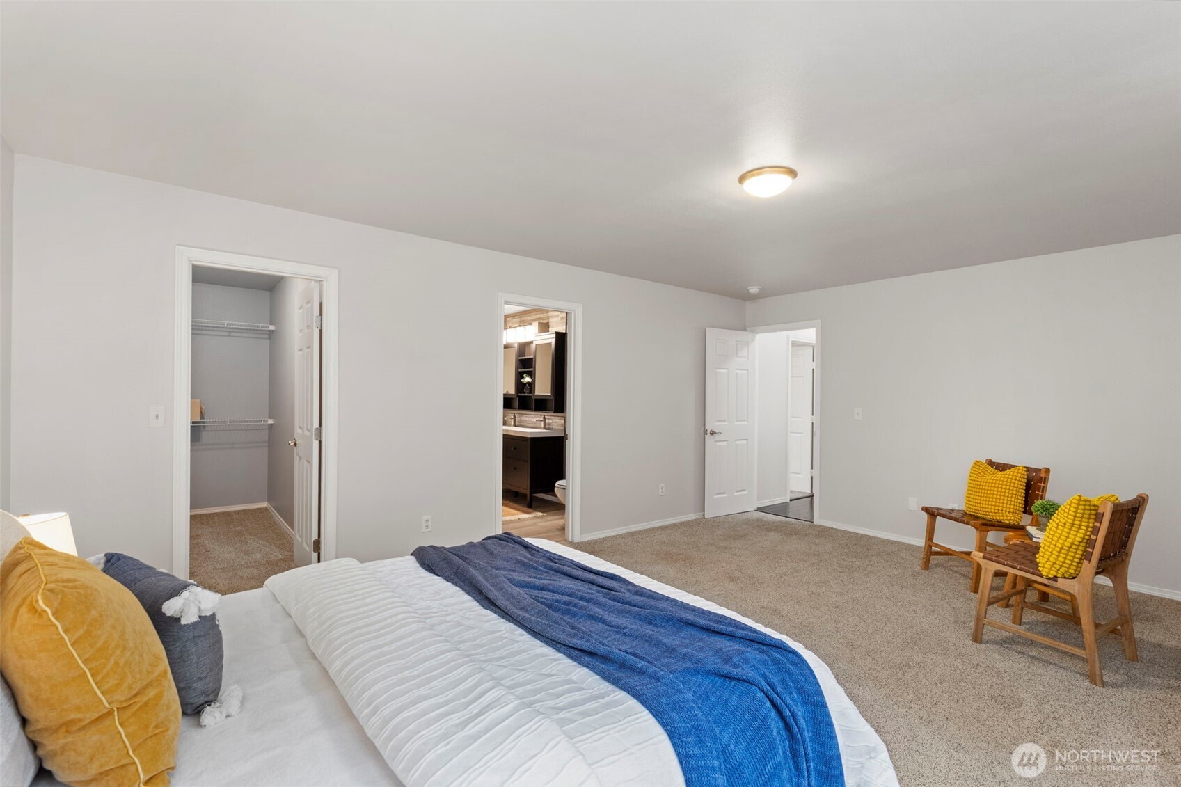 7506 353rd Street South Roy, WA 98580 - Photo 23 of 38 a bedroom with a bed and chair