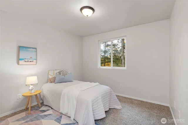 a room with a window and wooden floor
