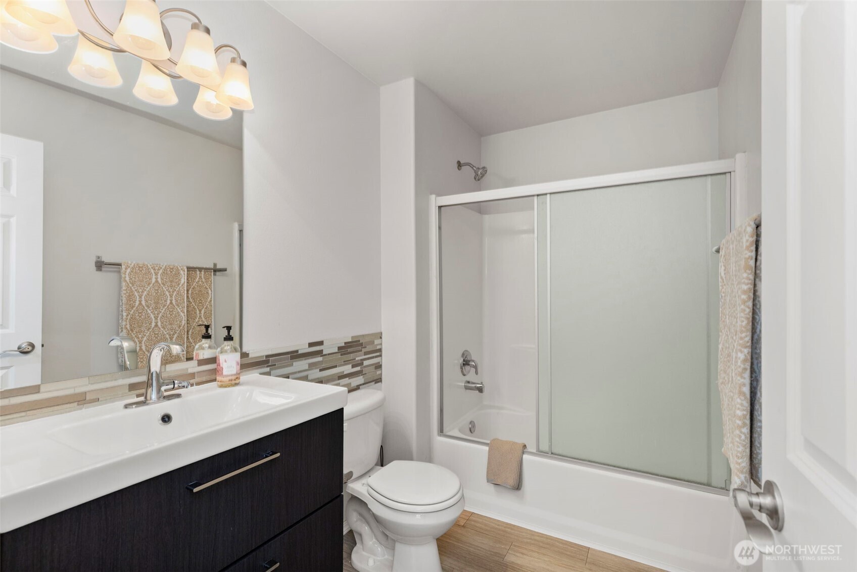 7506 353rd Street South Roy, WA 98580 - Photo 29 of 38 a bathroom with a double vanity sink mirror and toilet