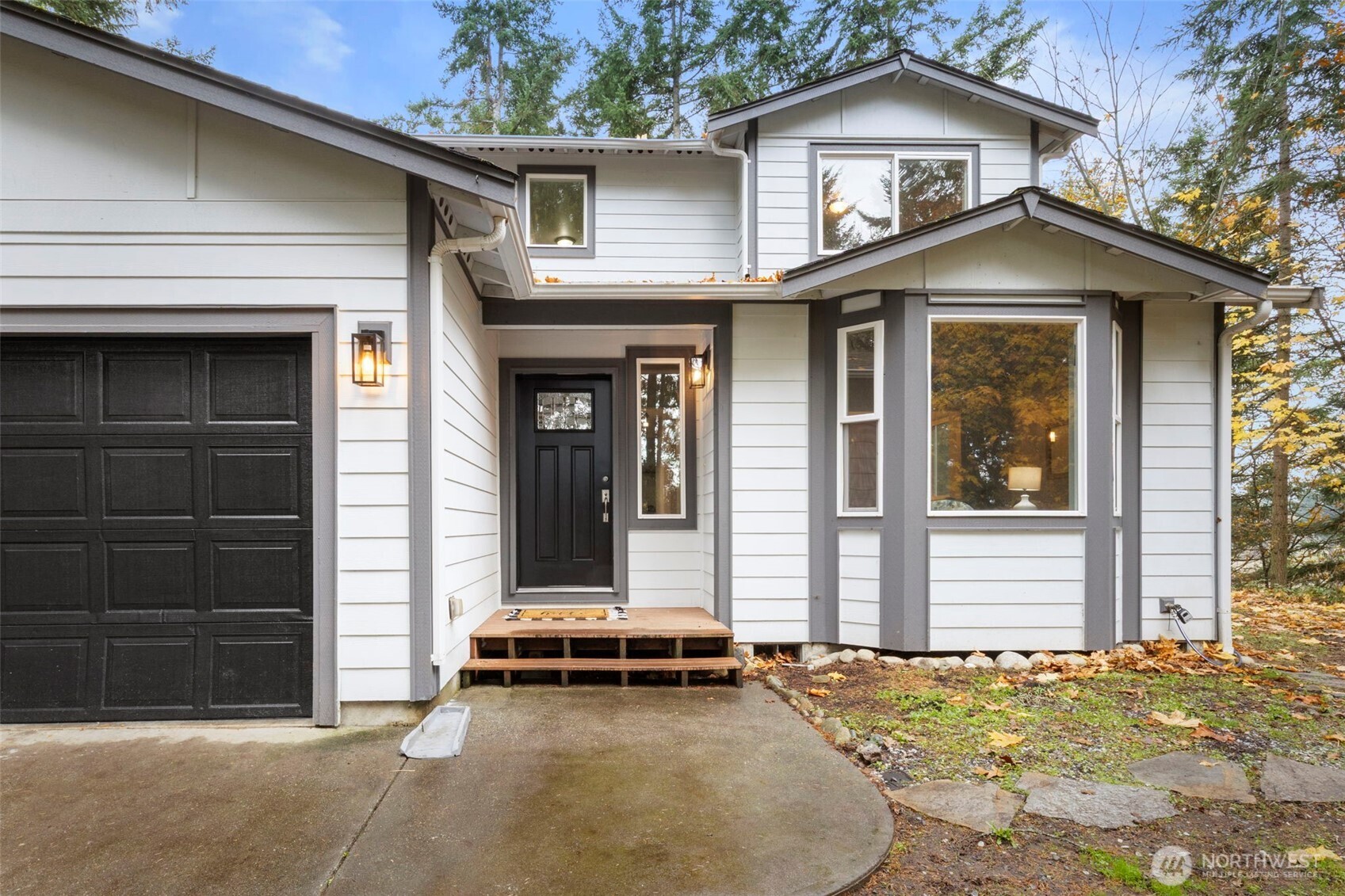 7506 353rd Street South Roy, WA 98580 - Photo 7 of 38 a view of a house with a outdoor space