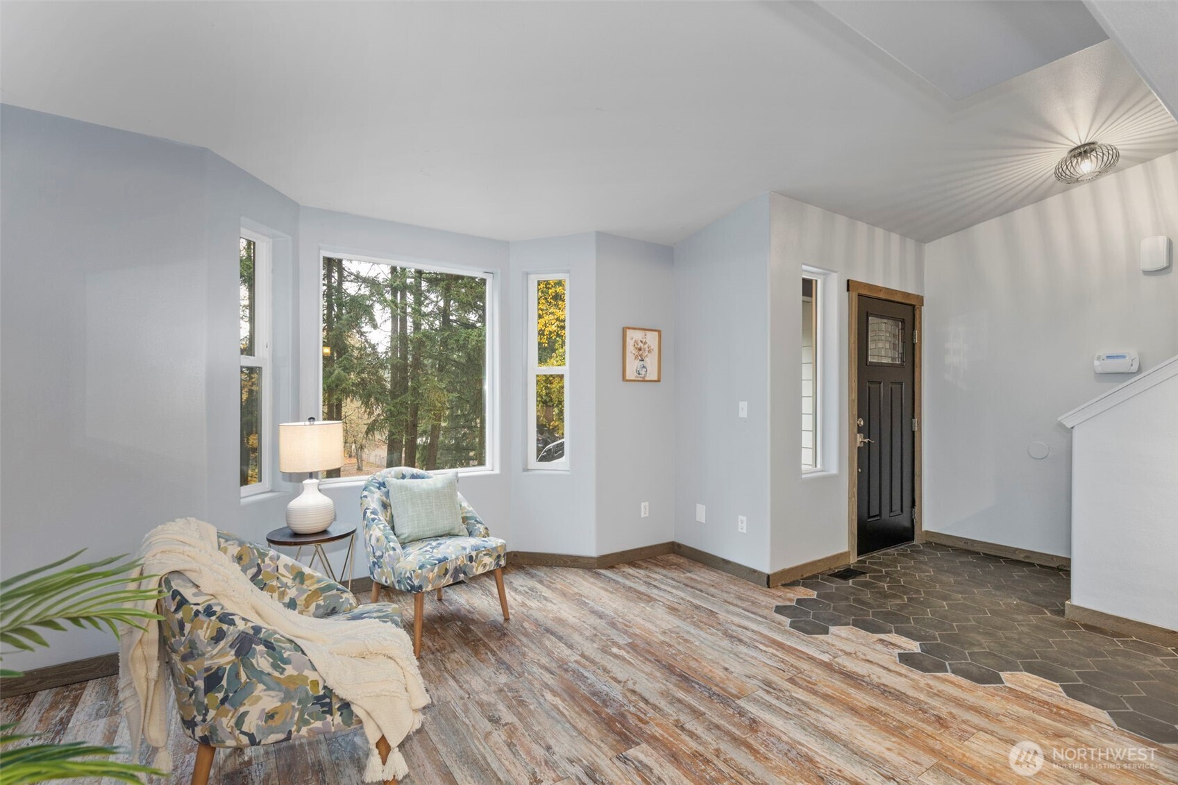 7506 353rd Street South Roy, WA 98580 - Photo 9 of 38 a living room with furniture and a large window