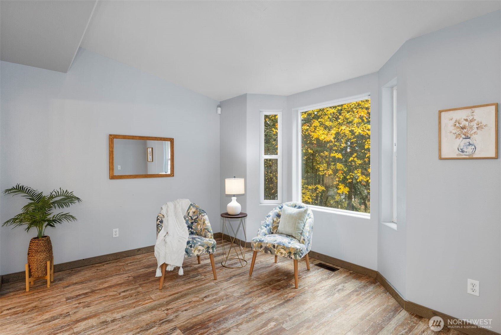 7506 353rd Street South Roy, WA 98580 - Photo 10 of 38 a living room with furniture and a potted plant