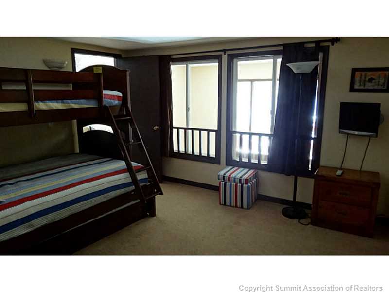 78 Guller Road, Unit 206 Frisco, CO 80443 - Photo 21 of 22 Bedroom. Bunk is a queen with a twin on top and a twin trundle slides out under the queen.