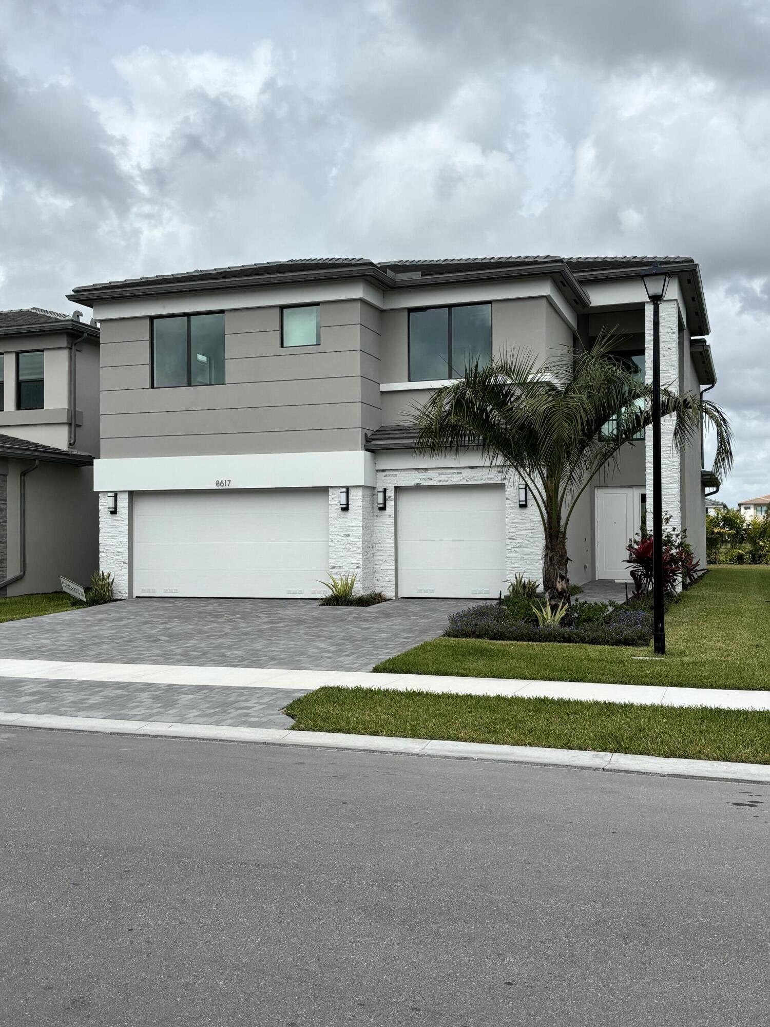 8617 Swinley Frst Way Boca Raton, FL 33434 - Photo 23 of 24 a front view of house with yard