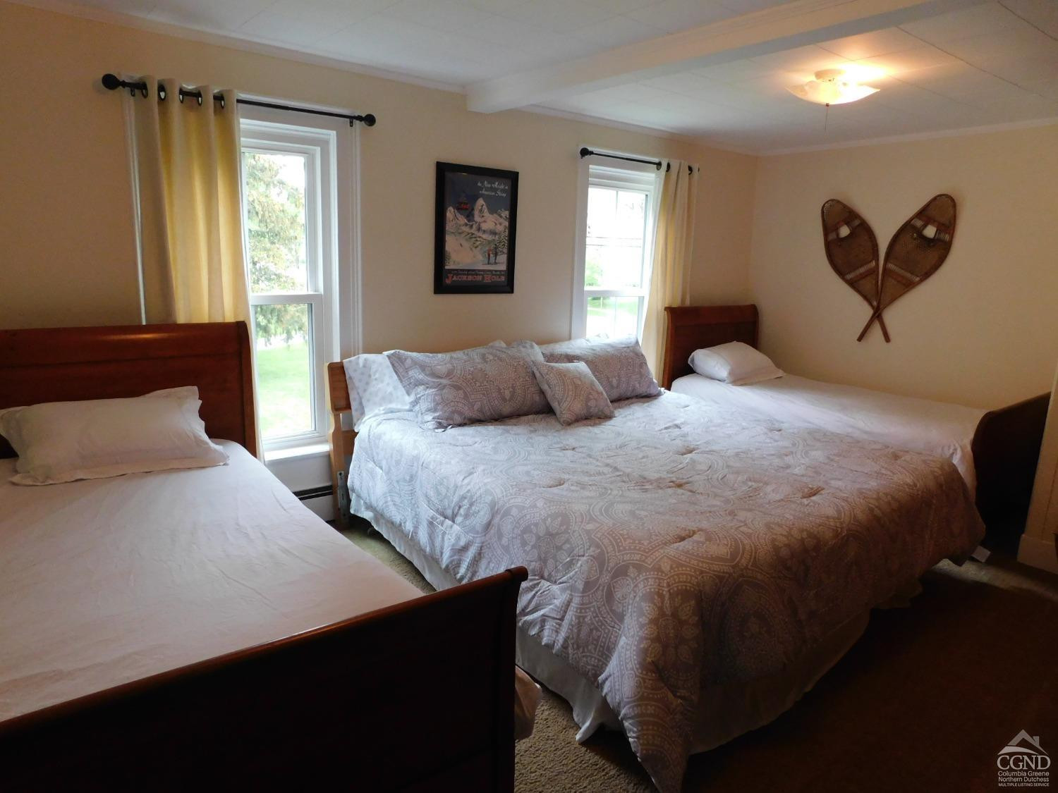 5474 Highway 23 Windham, NY 12496 - Photo 15 of 27 a bedroom with double bed and a window