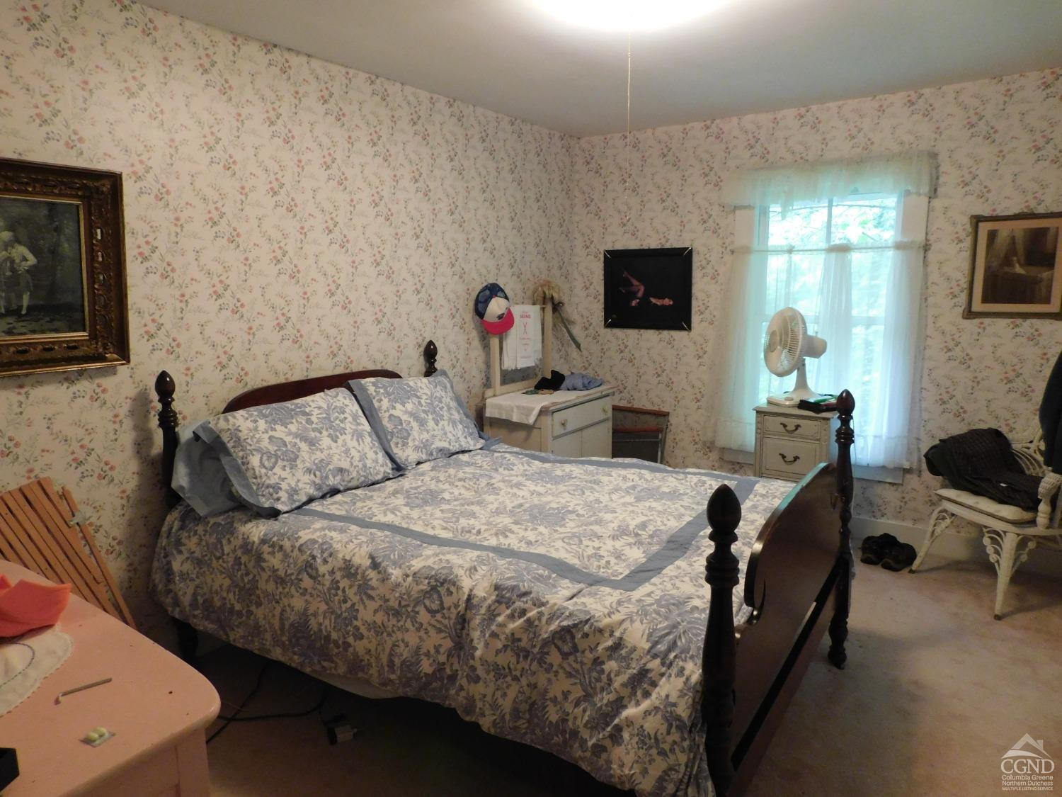 5474 Highway 23 Windham, NY 12496 - Photo 20 of 27 a bedroom with a bed and a flat screen tv