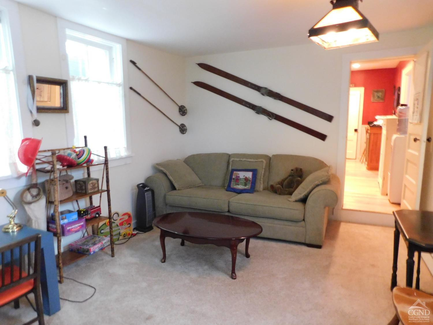 5474 Highway 23 Windham, NY 12496 - Photo 10 of 27 a living room with furniture and a window