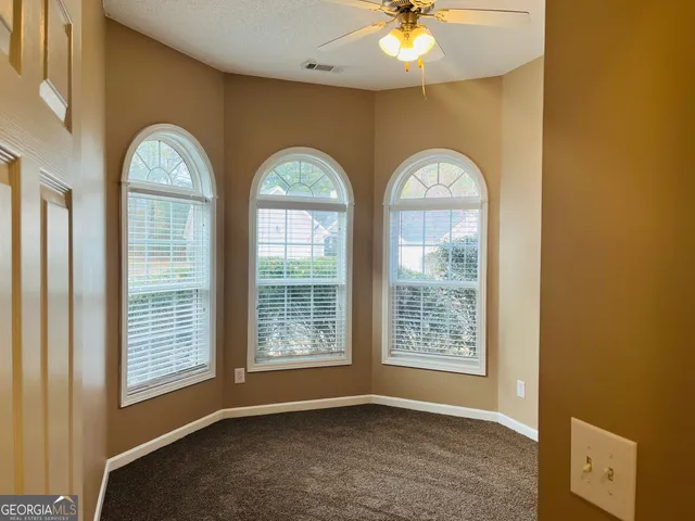a view of a livingroom with front door