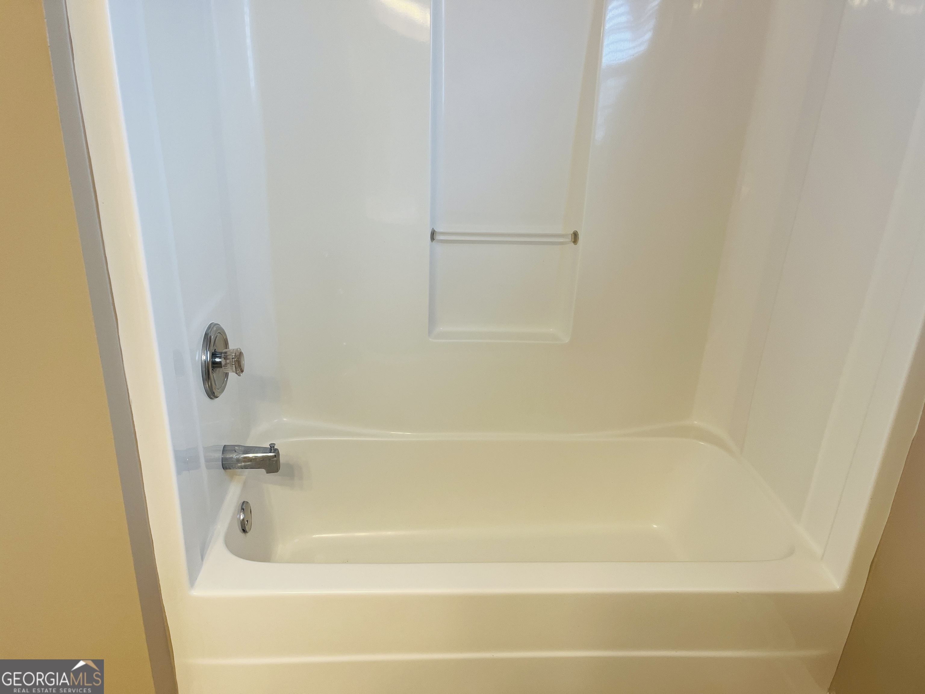 62 Green Spring Newnan, GA 30265 - Photo 24 of 31 a bathroom with a bathtub