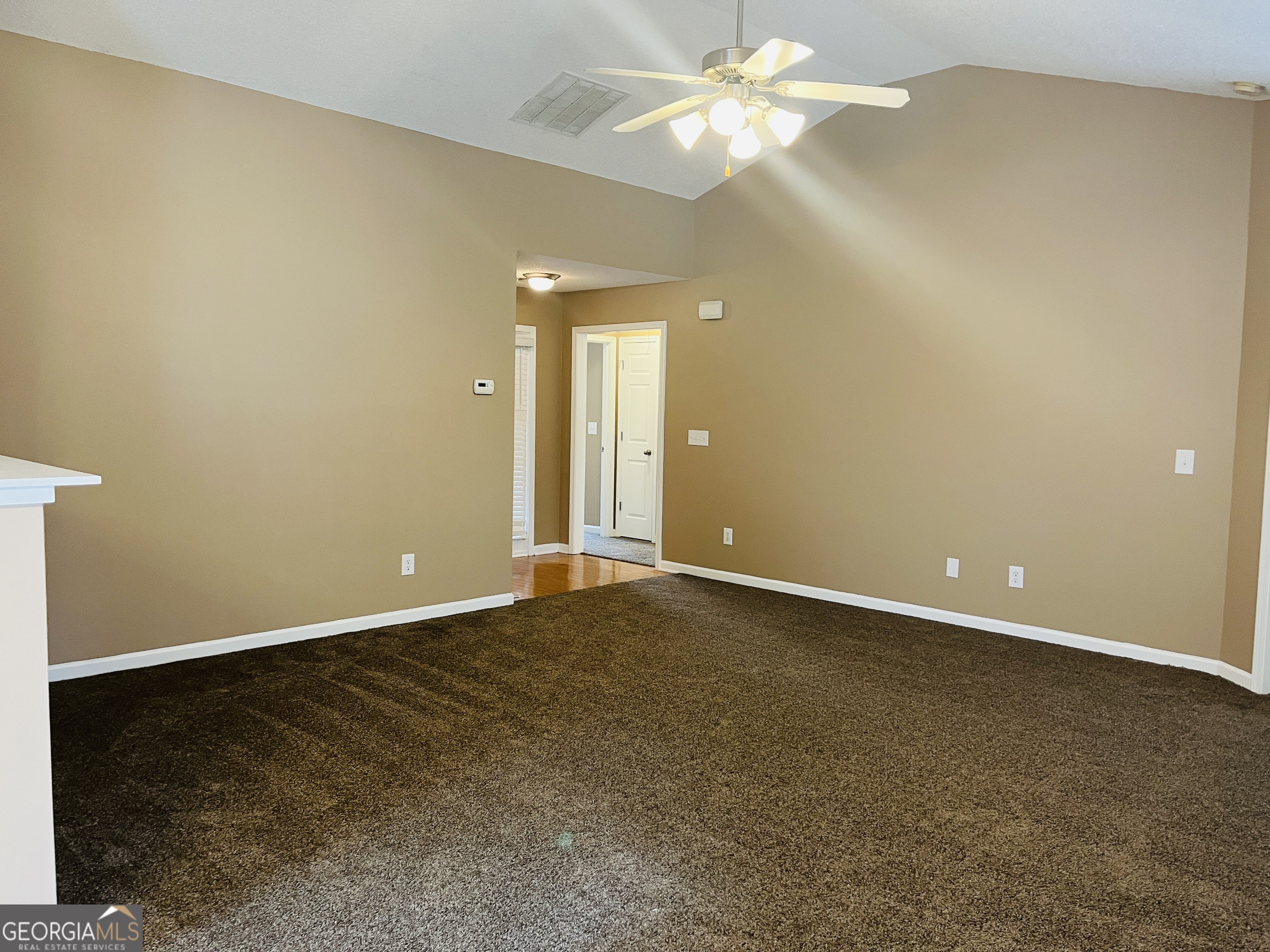 62 Green Spring Newnan, GA 30265 - Photo 7 of 31 wooden floor in an empty room