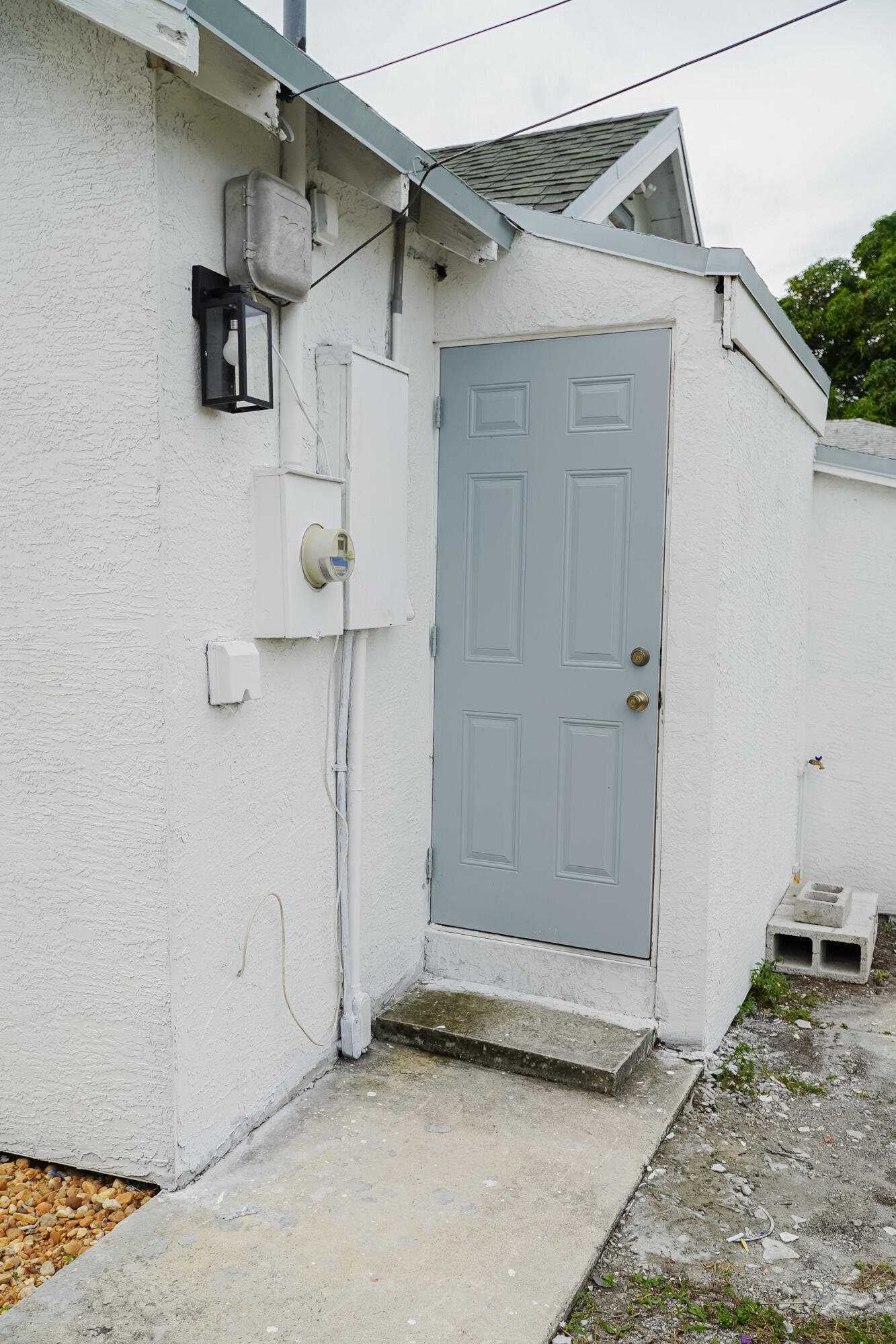 908 West 5th Street Riviera Beach, FL 33404 - Photo 11 of 40 EXIT DOOR FROM KITCHEN