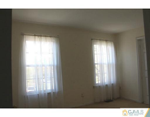 2204 Timber Oaks Road Edison, NJ 08820 - Photo 10 of 13 a open hall with a window