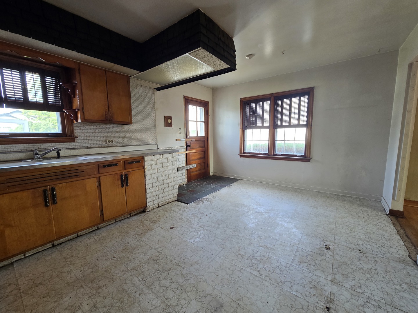 7742 South Oketo Avenue Bridgeview, IL 60455 - Photo 8 of 14 a kitchen with sink and cabinets
