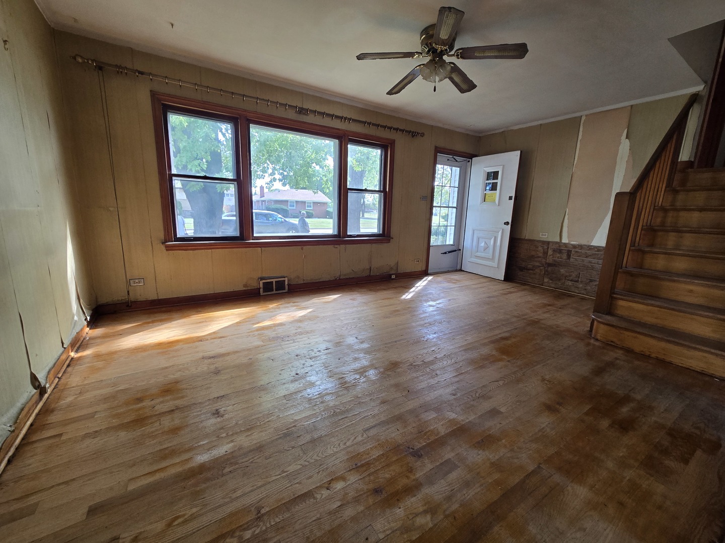 7742 South Oketo Avenue Bridgeview, IL 60455 - Photo 10 of 14 wooden floor in an empty room with a window