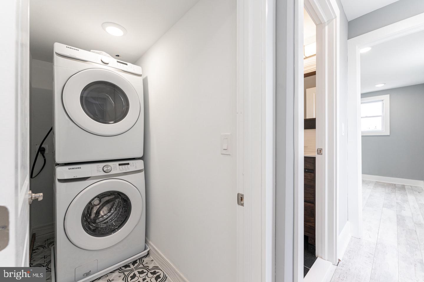 3252 Miller Street, Unit 2 Philadelphia, PA 19134 - Photo 15 of 16 a view of a hallway with washer and dryer