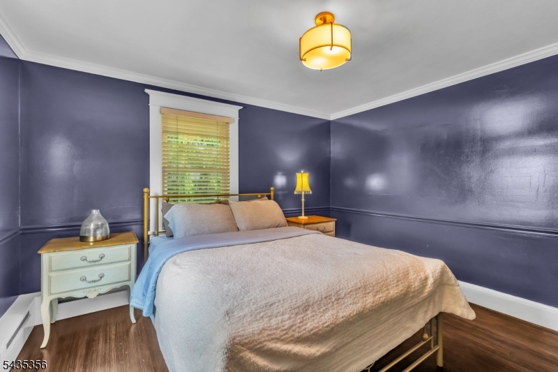 105 Somerville Road Bedminster, NJ 07921 - Photo 14 of 36 a bedroom with a bed and a window