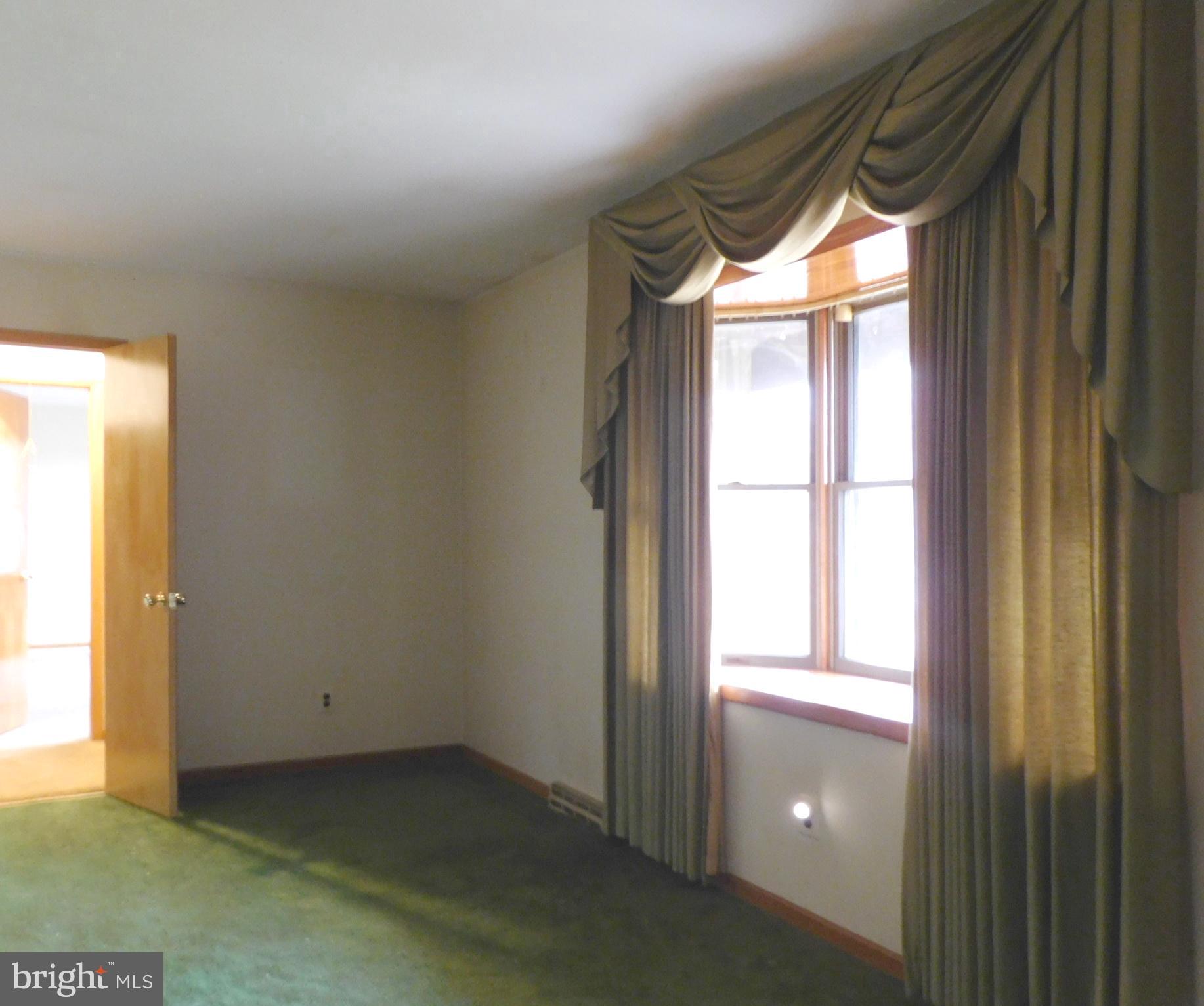 210 Orchard Avenue Delanco, NJ 08075 - Photo 34 of 38 Living room picture window front of house