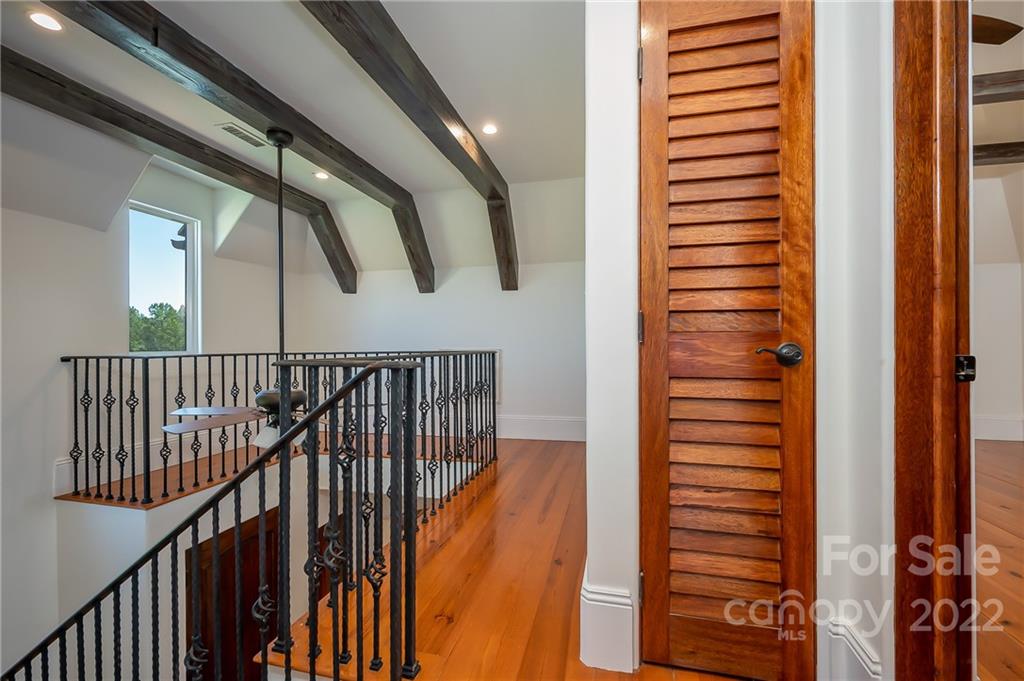 20 Hawk Ridge Drive Mill Spring, NC 28756 - Photo 19 of 48 a view of staircase with railing and white walls