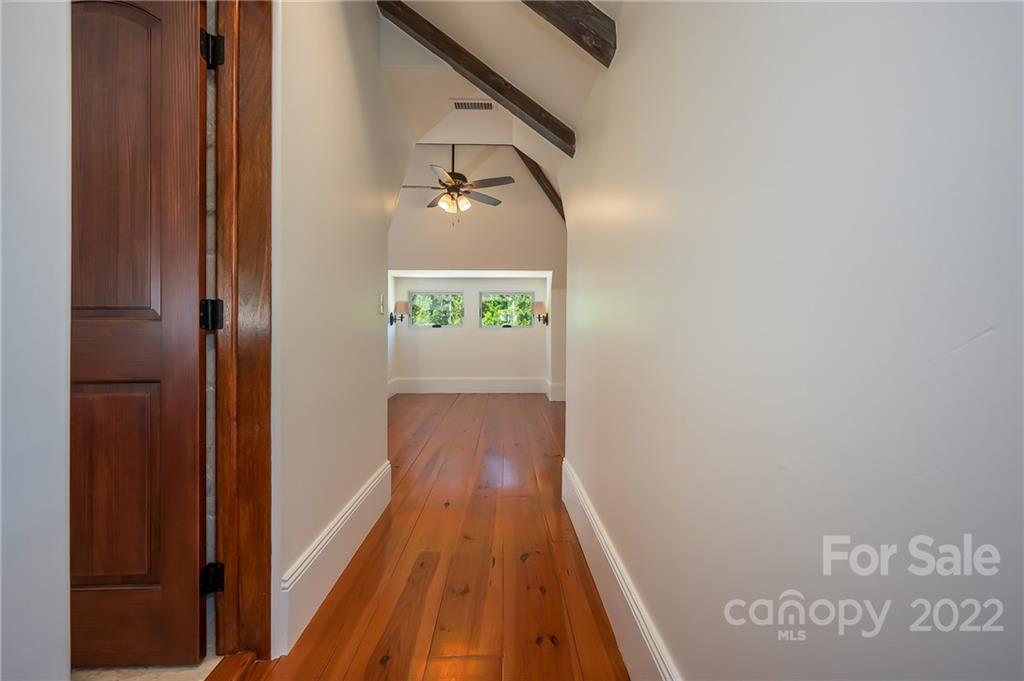 20 Hawk Ridge Drive Mill Spring, NC 28756 - Photo 20 of 48 a view of a hallway with wooden floor