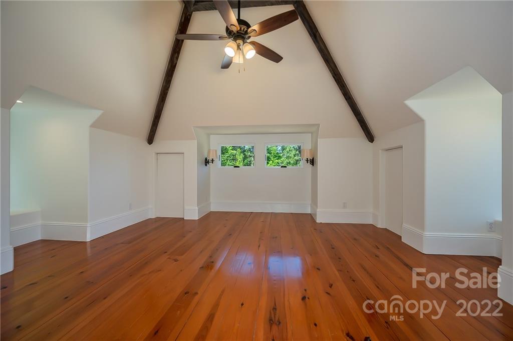 20 Hawk Ridge Drive Mill Spring, NC 28756 - Photo 23 of 48 wooden floor in an empty room with a window