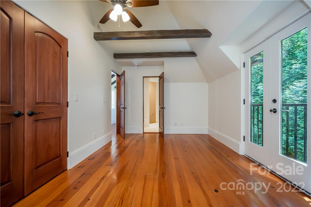 20 Hawk Ridge Drive Mill Spring, NC 28756 - Photo 29 of 48 a view of empty room with wooden floor and fan