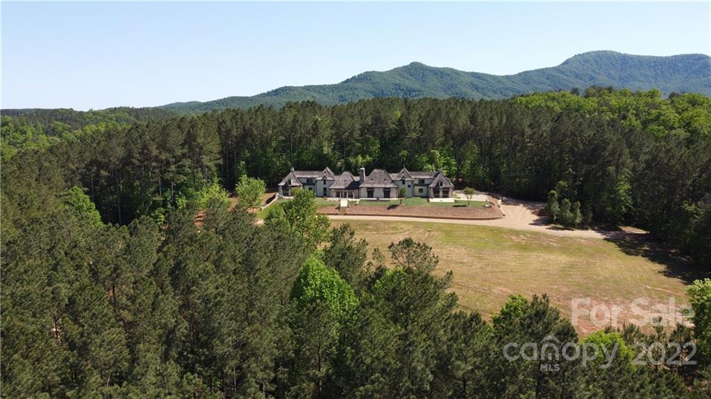 20 Hawk Ridge Drive Mill Spring, NC 28756 - Photo 3 of 48 a view of a house with mountain view