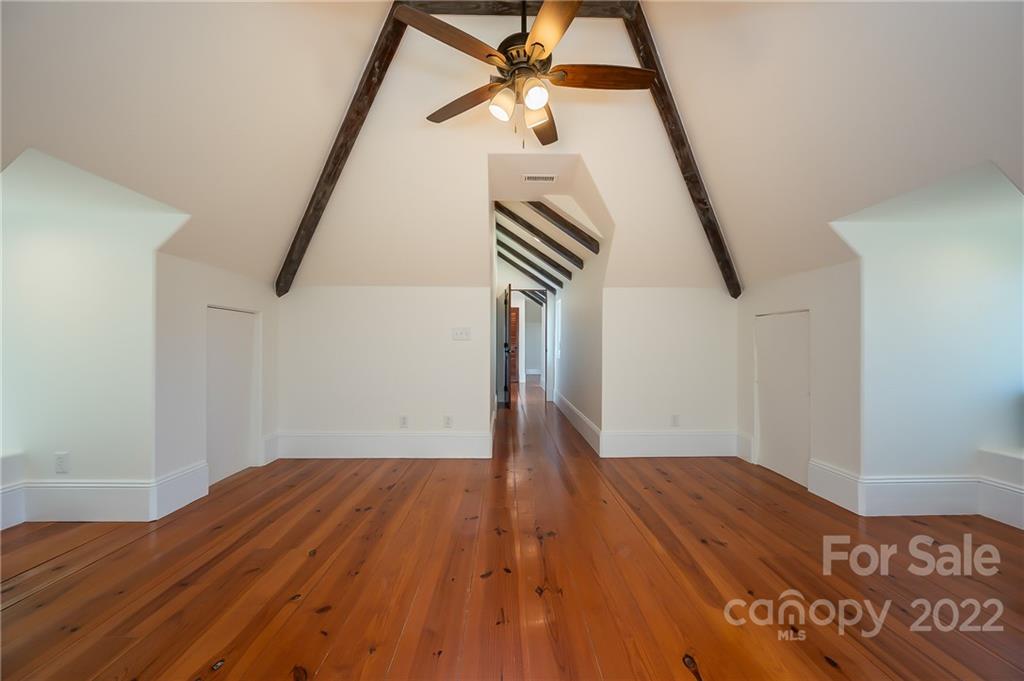 20 Hawk Ridge Drive Mill Spring, NC 28756 - Photo 36 of 48 a view of empty room with wooden floor and fan