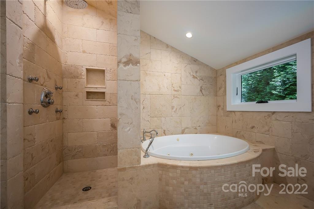 20 Hawk Ridge Drive Mill Spring, NC 28756 - Photo 38 of 48 a bathroom with a shower