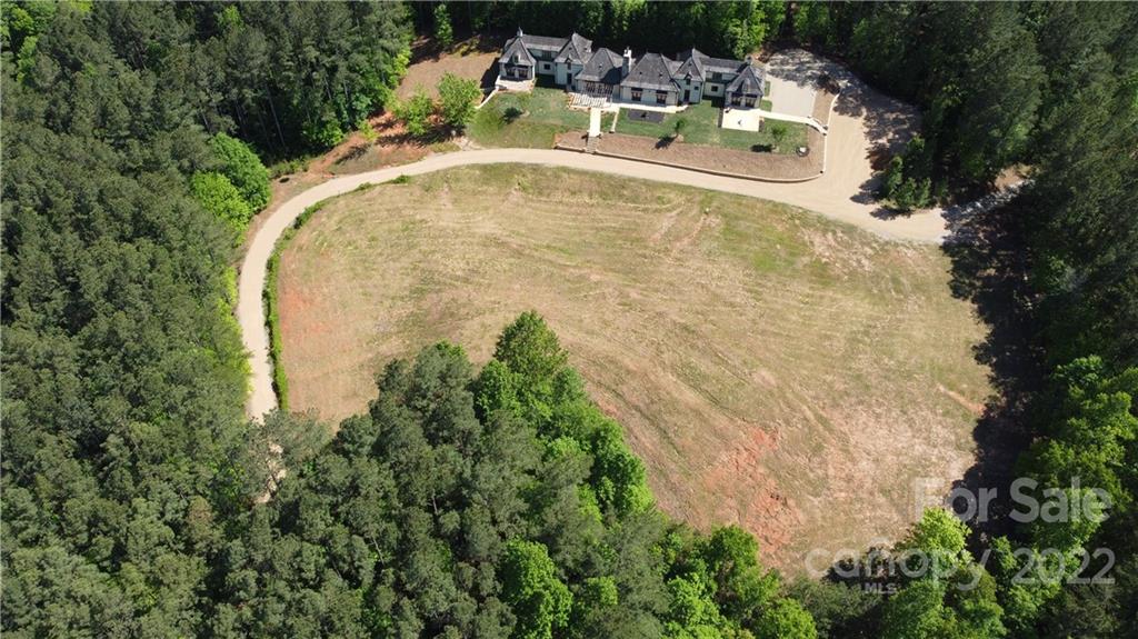 20 Hawk Ridge Drive Mill Spring, NC 28756 - Photo 6 of 48 a swimming pool with some trees in the background