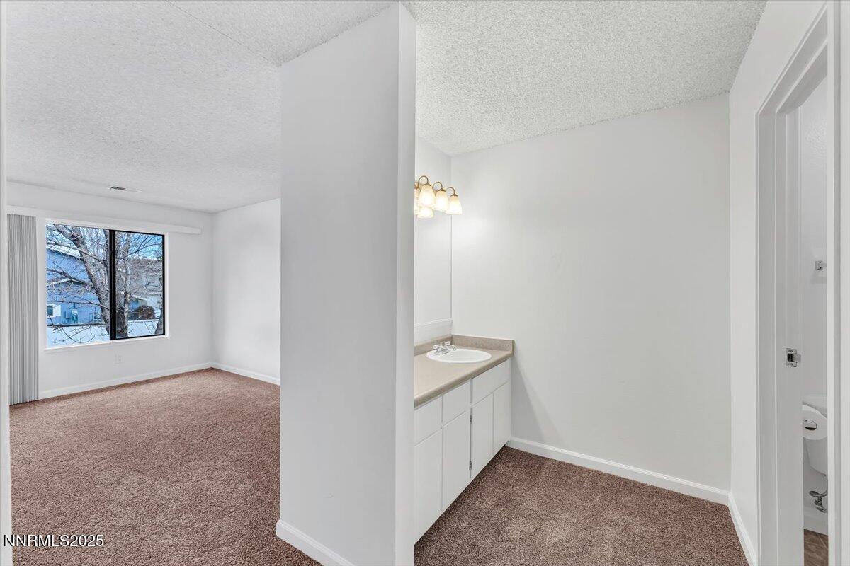 3230 Wedekind Road, Unit 64 Sparks, NV 89431 - Photo 15 of 28 an empty room with windows